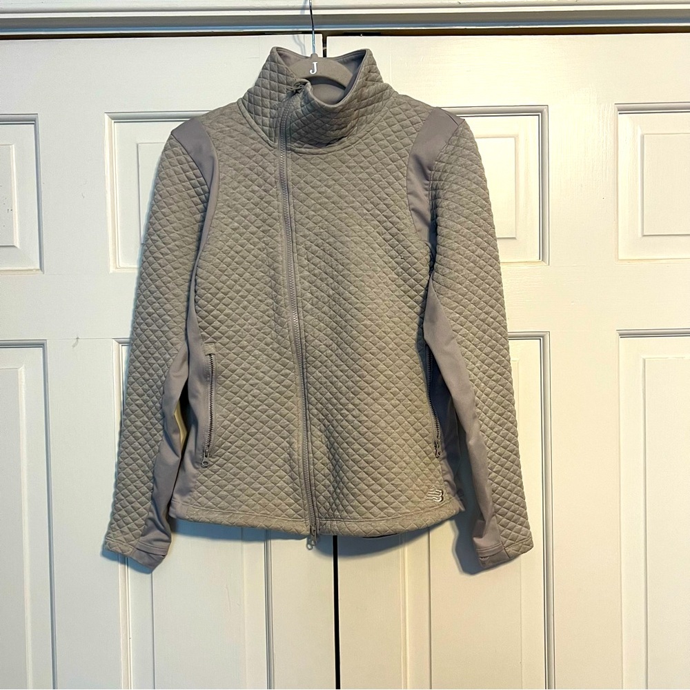 New Balance Quilted double zip jacket with side pockets size small